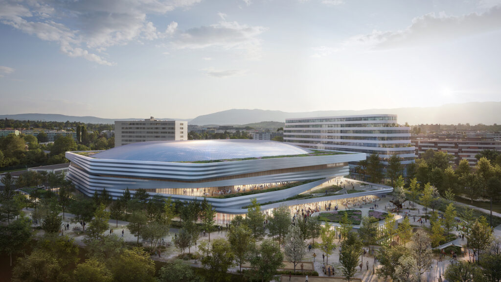 Vue aérienne de la patinoire Trèfle Blanc à Genève, projet lauréat conçu par Chabanne Archi Ingé, montrant le bâtiment sculptural avec son toit aux multiples écailles photovoltaïques, ses terrasses végétalisées aux formes organiques et ses espaces publics.