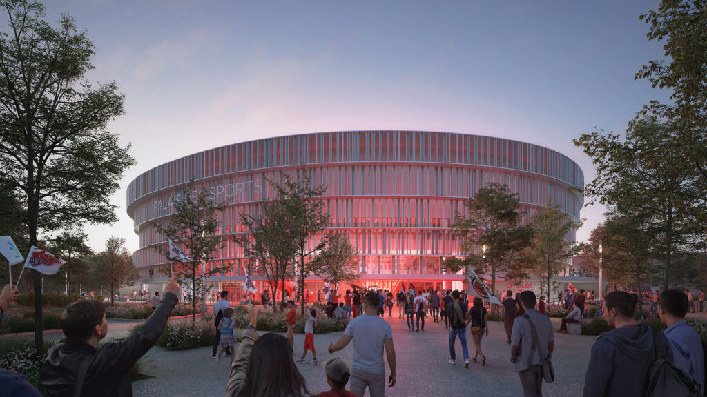 Vue extérieure de soirée du Palais des sports de Cholet, projet lauréat conçu par Chabanne Archi Ingé, montrant les supporters sur le parvis devant l'entrée du bâtiment aux lames verticales rétroéclairées en rouge aux couleurs de Cholet Basket.